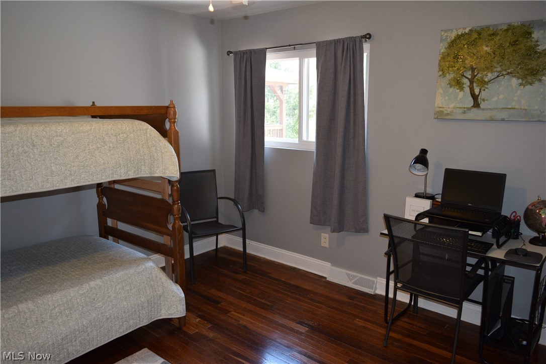 3285 Hemphill Road Barberton, OH 44203 - Photo 25 of 50 Bedroom featuring dark hardwood / wood-style flooring