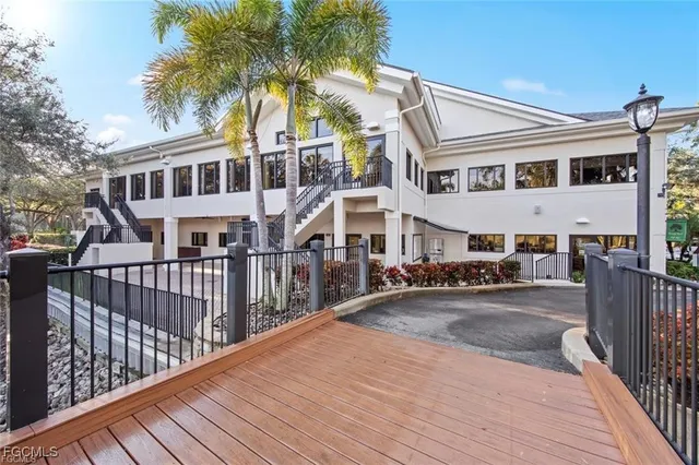 an aerial view of residential house with outdoor space and swimming pool