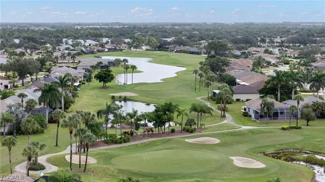 a view of a chairs and table in a patio