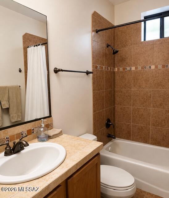 2018 East River Road, Unit 102 Tucson, AZ 85718 - Photo 15 of 25 a bathroom with a sink toilet and shower