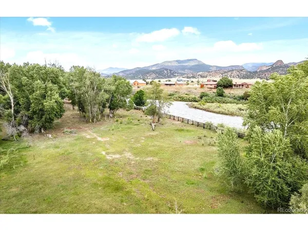 a view of swimming pool with outdoor seating