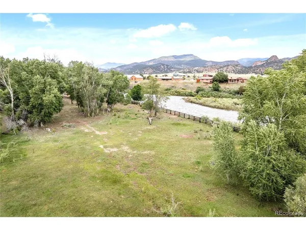 a view of an ocean and a mountain