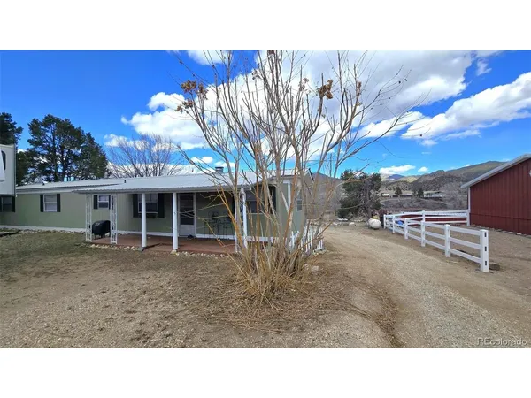 a black and white photo of a house