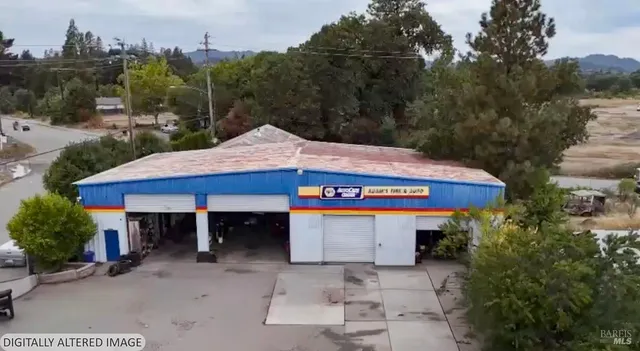 a view of a patio in front of retail shops