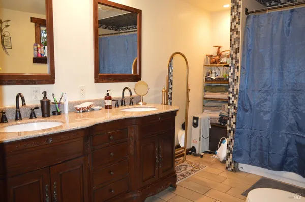 a bathroom with a toilet and a sink