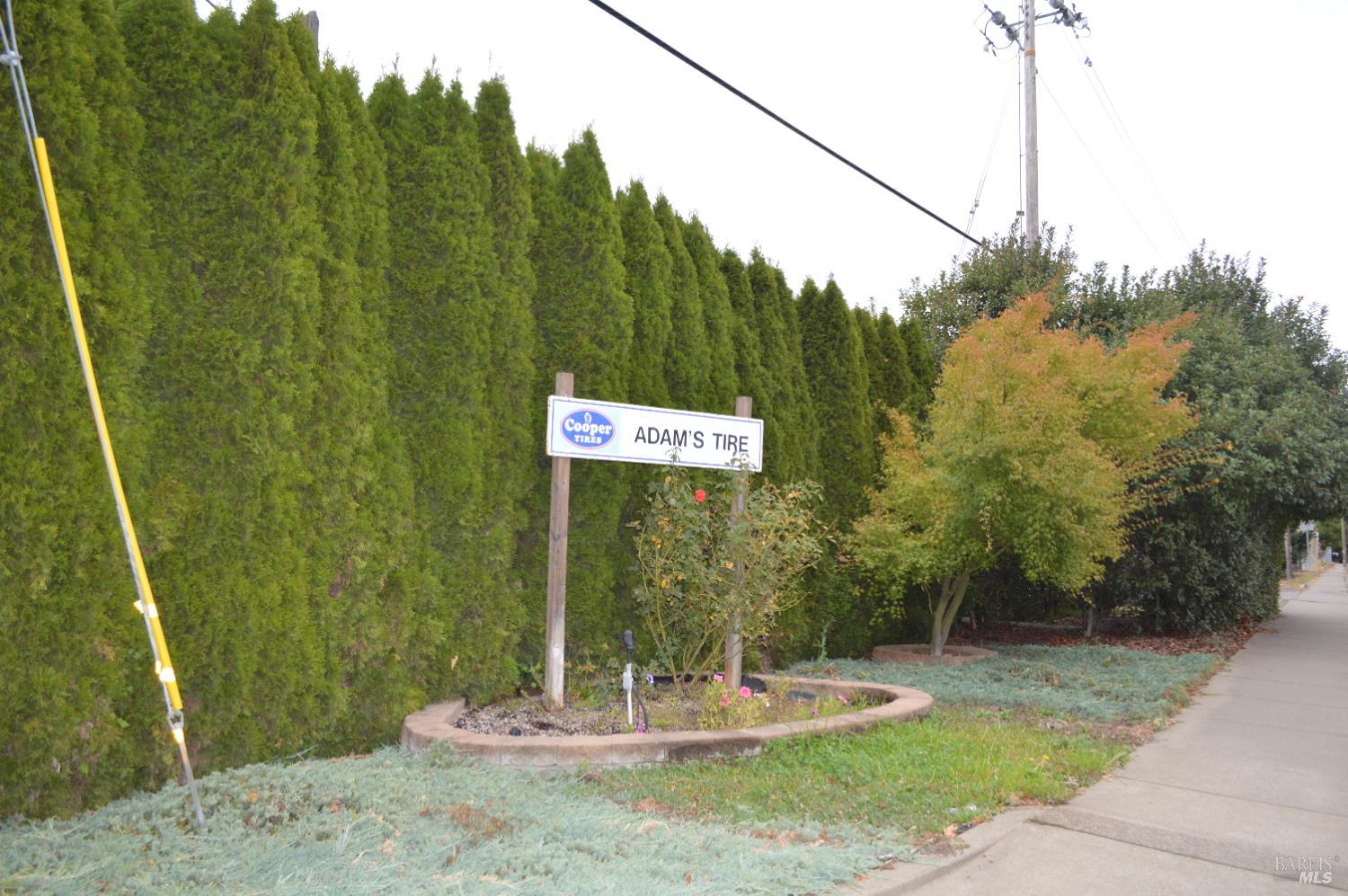 230 Shell Lane Willits, CA 95490 - Photo 5 of 32 a sign that is sitting on a brick wall