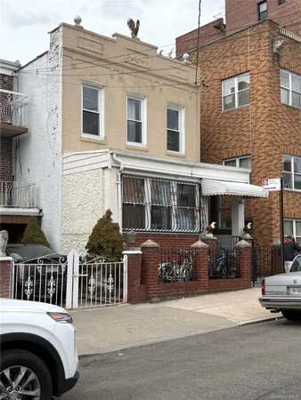 a front view of a house with parking space