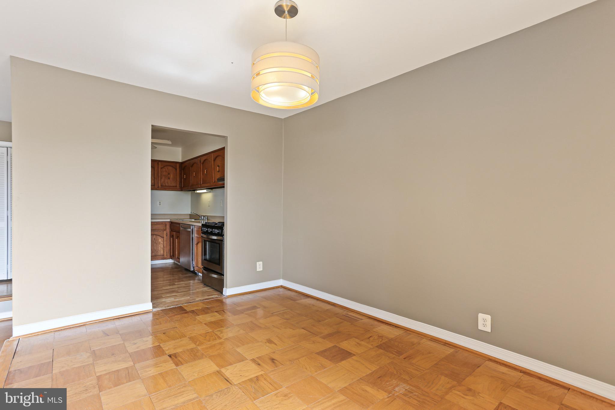 9900 Georgia Avenue, Unit 27708 Silver Spring, MD 20902 - Photo 11 of 32 A Dining Room that will fit 6-8 people