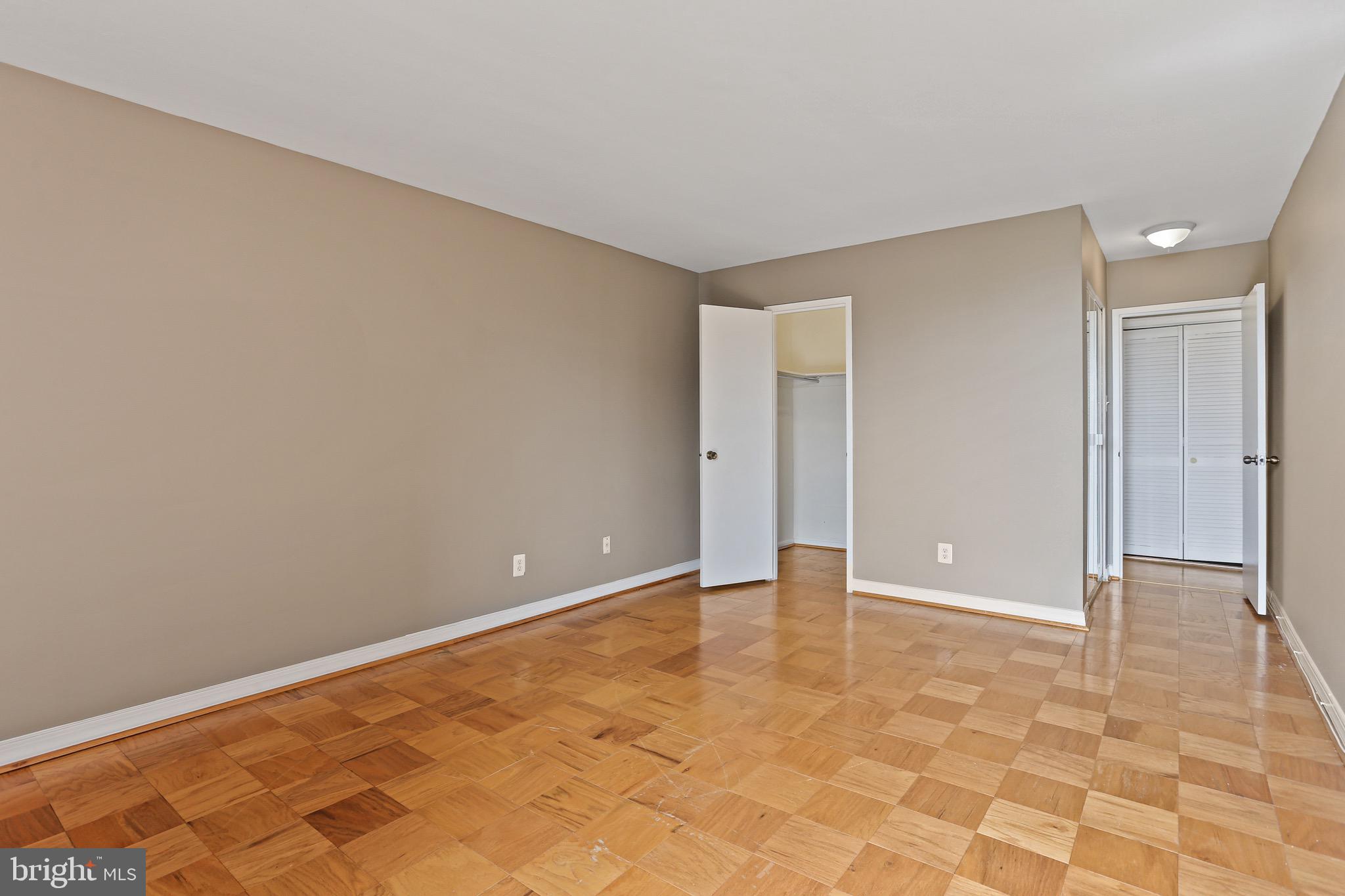 9900 Georgia Avenue, Unit 27708 Silver Spring, MD 20902 - Photo 18 of 32 2 Closets in the Primary Bedroom
