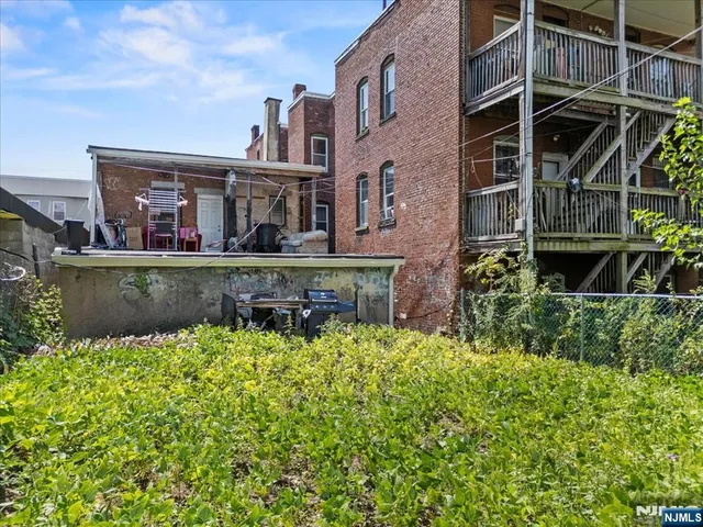 front view of a house with a small yard