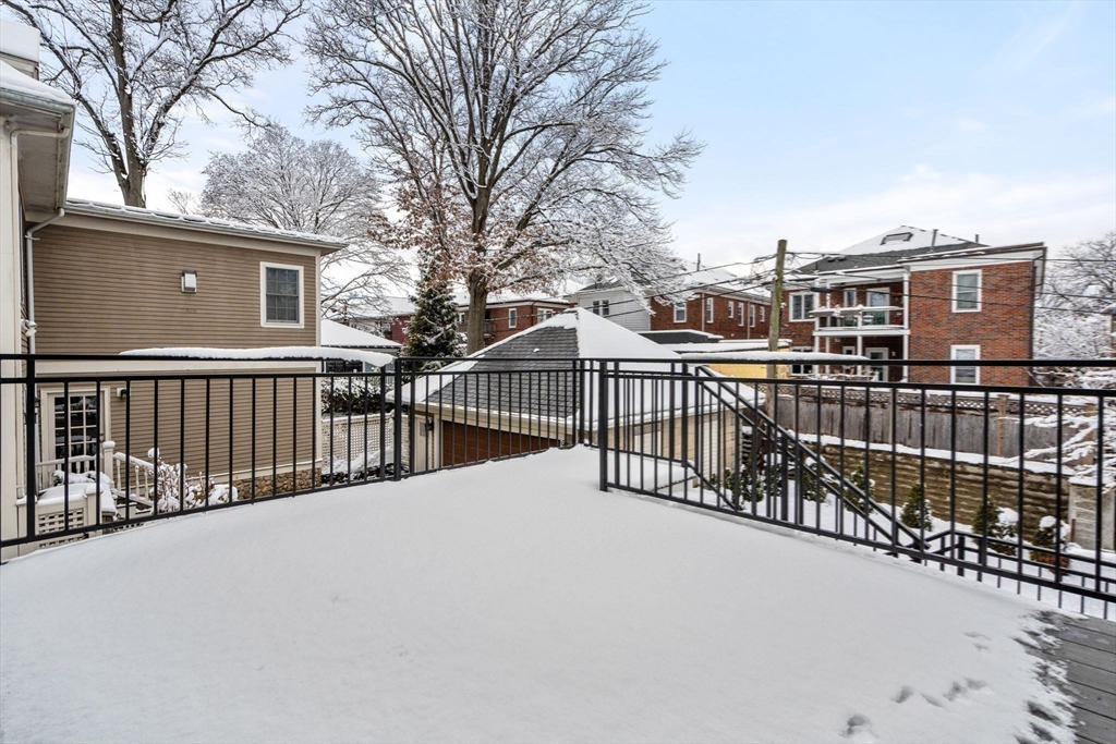 116 Thorndike Street, Unit 2B Brookline, MA 02446 - Photo 31 of 33 a view of a balcony with city