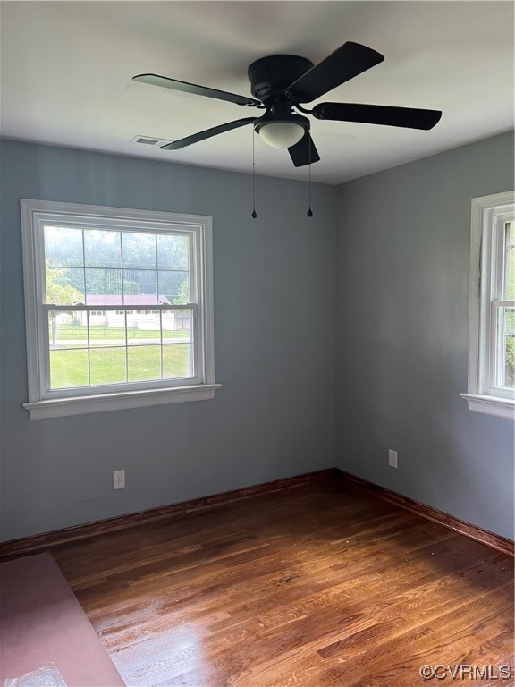 7640 Strath Road Henrico, VA 23231 - Photo 4 of 10 a view of empty room with wooden floor and fan