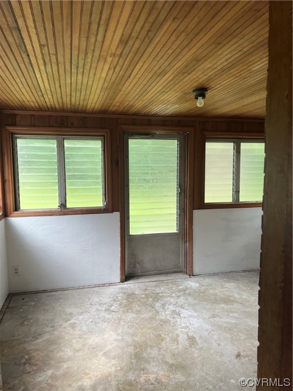 7640 Strath Road Henrico, VA 23231 - Photo 7 of 10 an empty room with a window and a kitchen