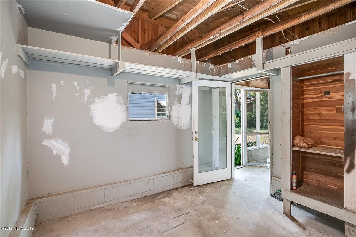1742 Planters Road Jacksonville, FL 32207 - Photo 18 of 18 a view of a room with wooden walls