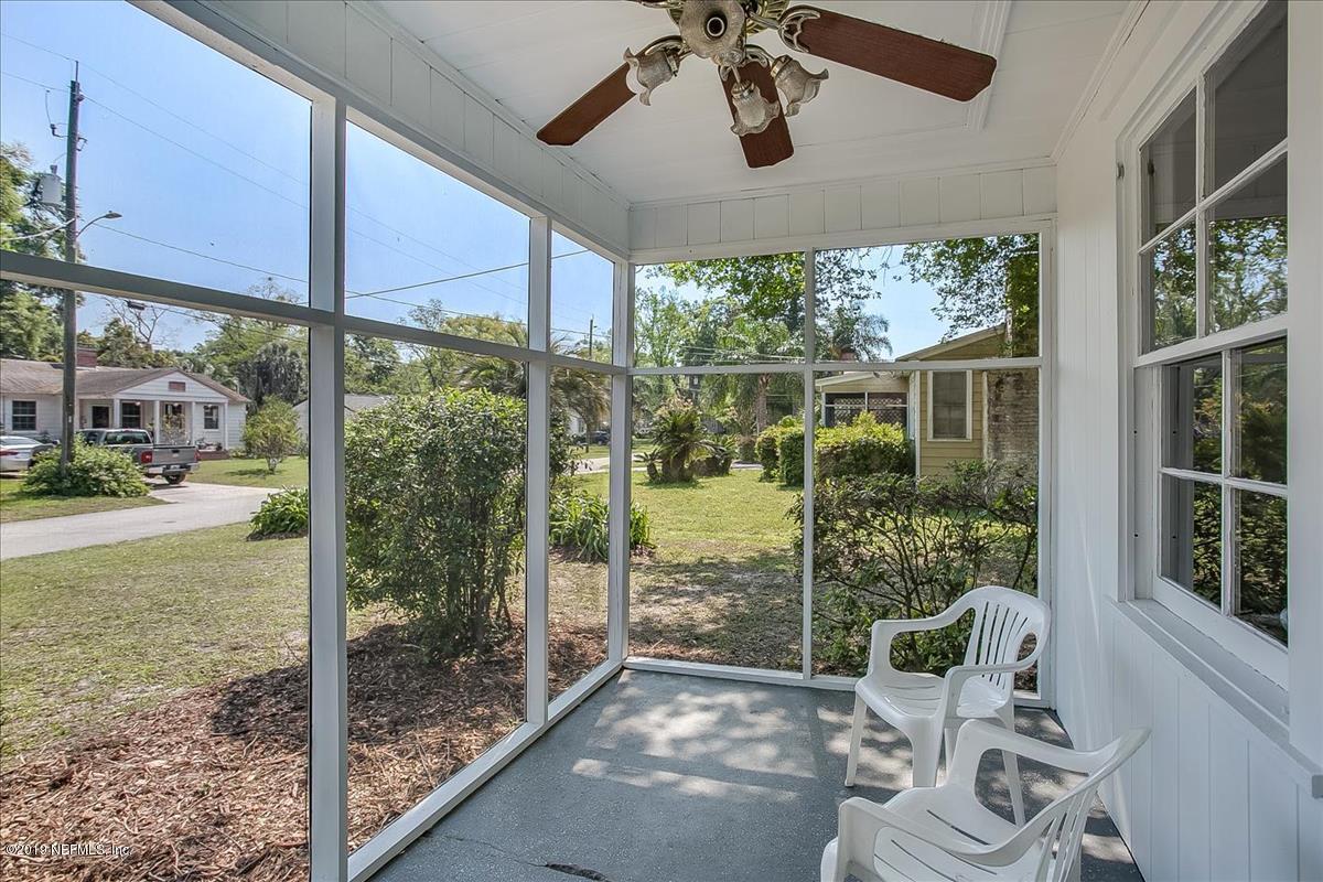 1742 Planters Road Jacksonville, FL 32207 - Photo 3 of 18 a living room with hardwood floor and ceiling fan