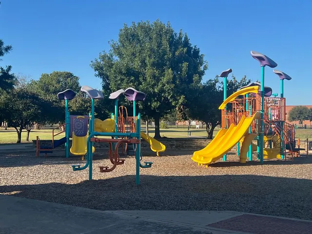 a view of a park with slide