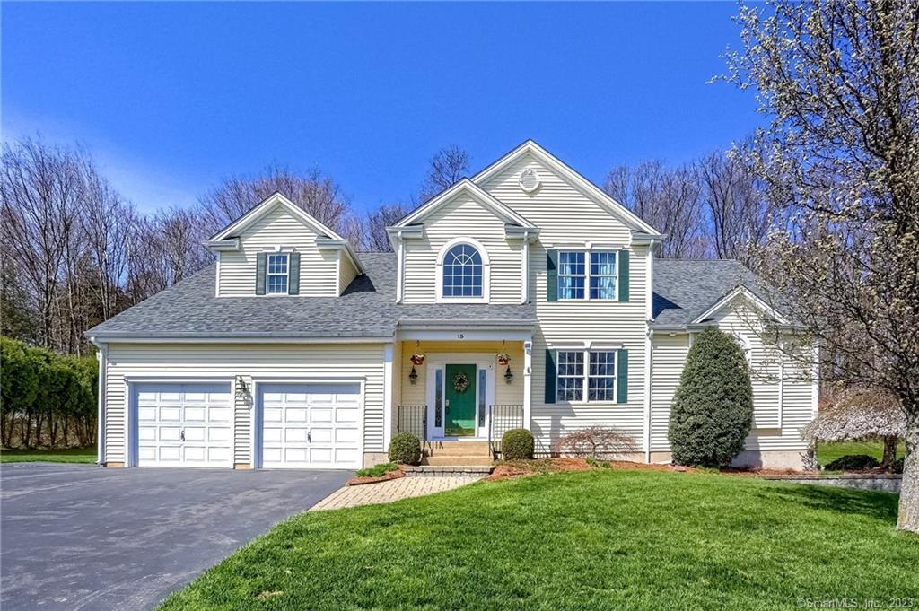 15 Valley View Road Manchester, CT 06040 - Photo 1 of 1 a front view of a house with a yard and trees