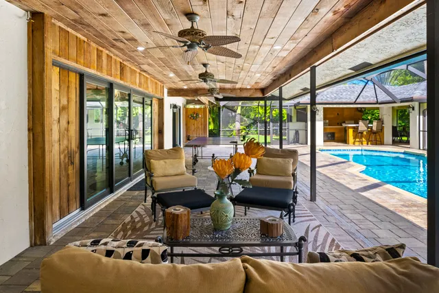 a view of a swimming pool with a patio