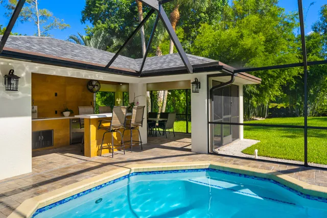 a kitchen with a stove and a refrigerator