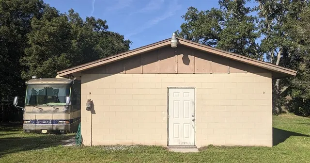a backyard of a house with lots of green space