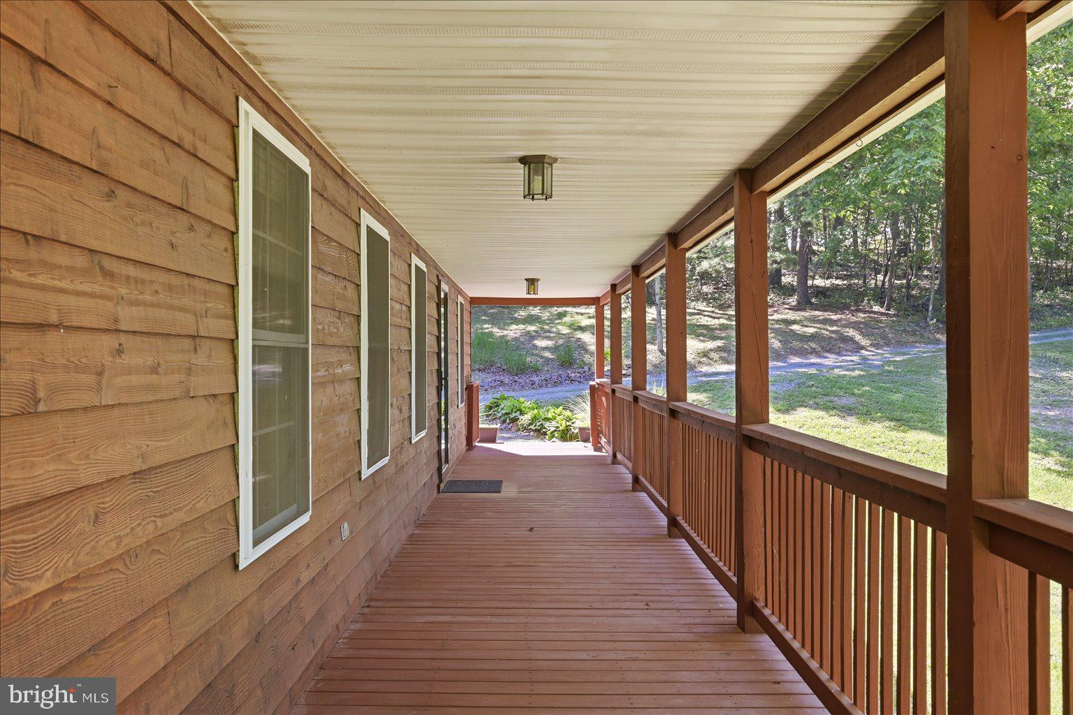 323 South Timber Ridge Road Cross Junction, VA 22625 - Photo 13 of 109 Charming porch with serene views.