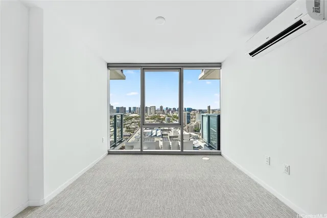 an empty room with a large window with outer view