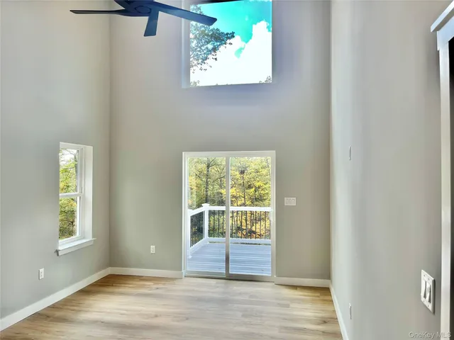 a view of entryway with wooden floor
