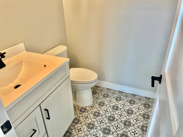 a bathroom with a sink and a toilet
