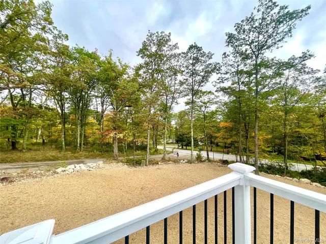 a view of street with a yard