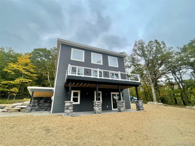 a view of a house with a patio