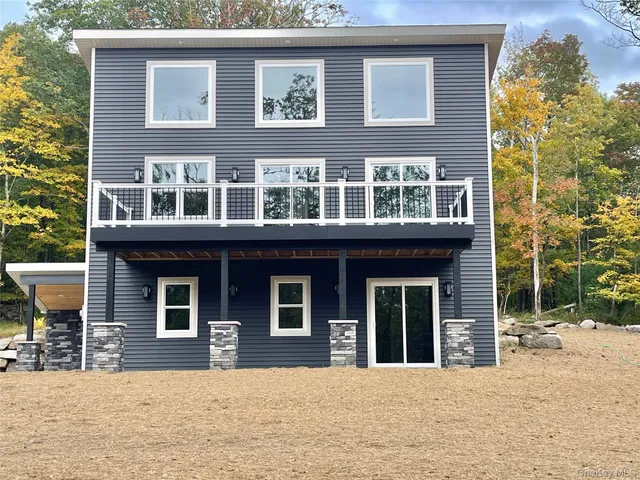 a view of a brick building with many windows
