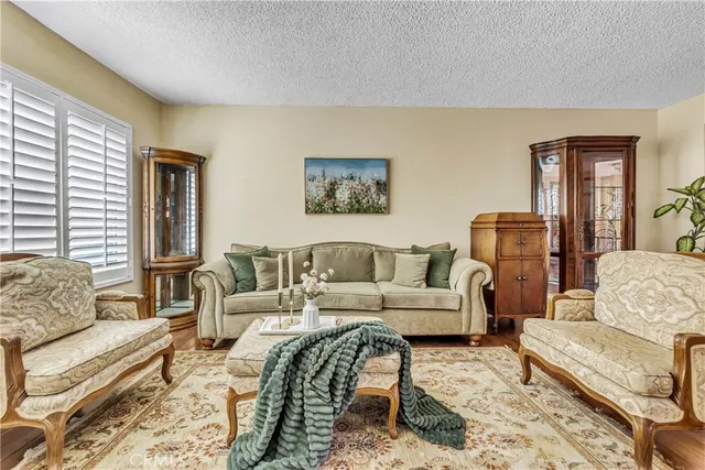 a living room with furniture and a couch