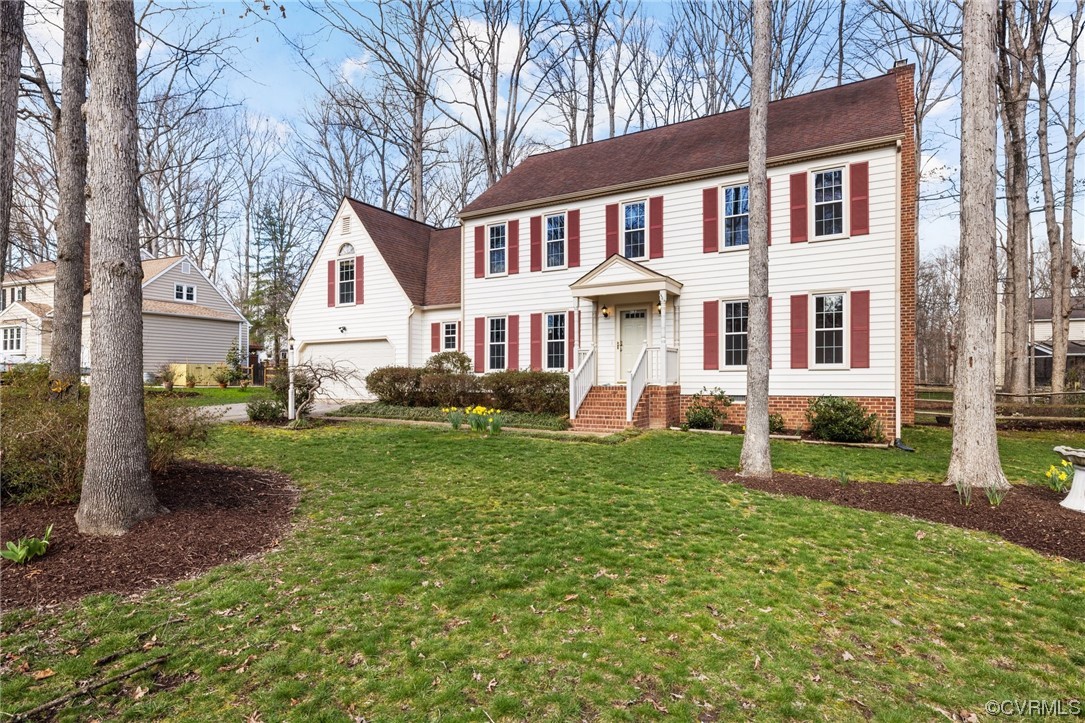 13809 Shadow Ridge Road Midlothian, VA 23112 - Photo 1 of 36 a front view of a house with a yard