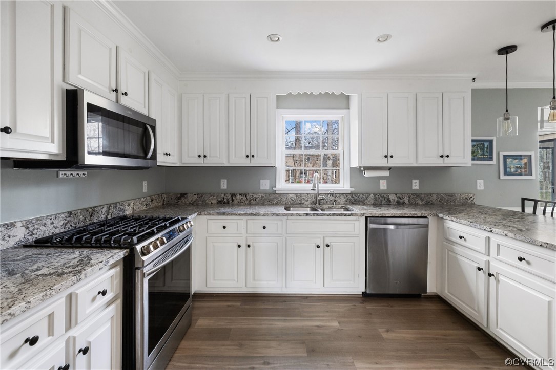 13809 Shadow Ridge Road Midlothian, VA 23112 - Photo 11 of 36 a kitchen with granite countertop white cabinets and stainless steel appliances