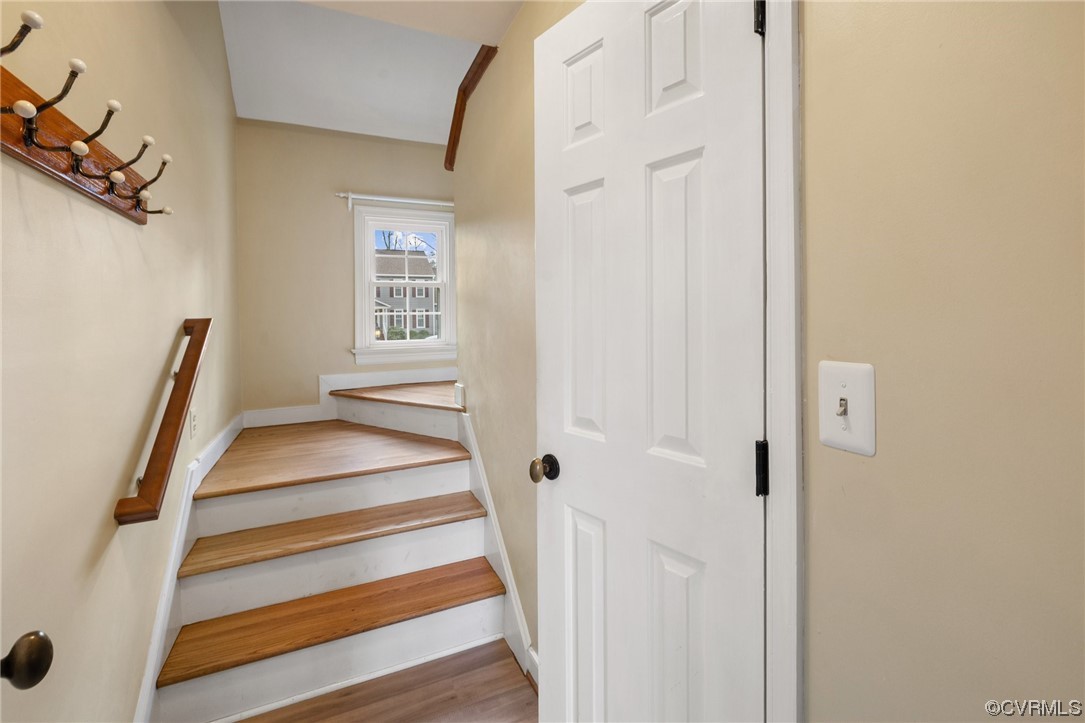 13809 Shadow Ridge Road Midlothian, VA 23112 - Photo 16 of 36 a view of a hallway with wooden floor and entryway