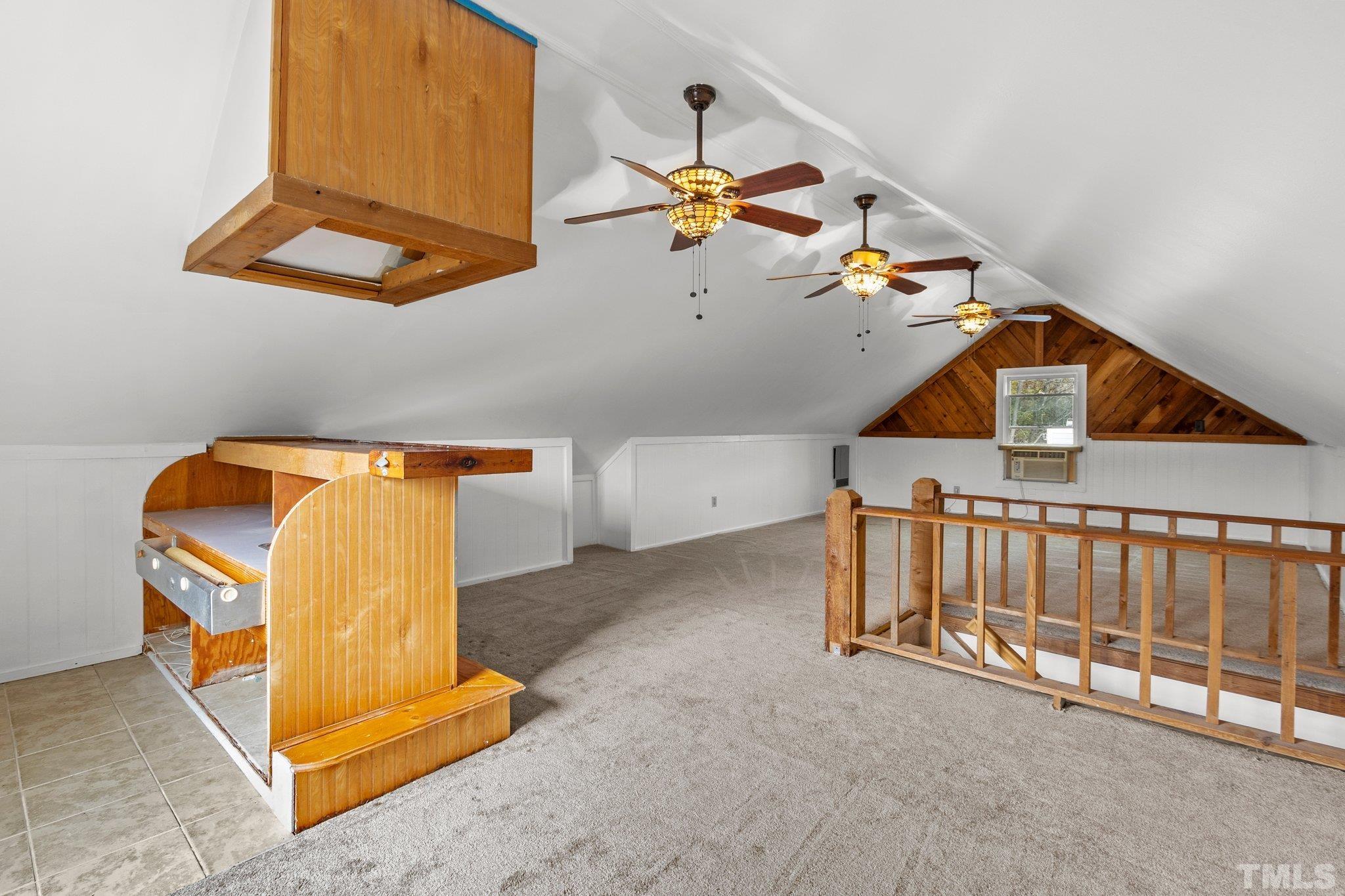 1305 Logan Street Durham, NC 27704 - Photo 17 of 32 a view of a room with gym equipment