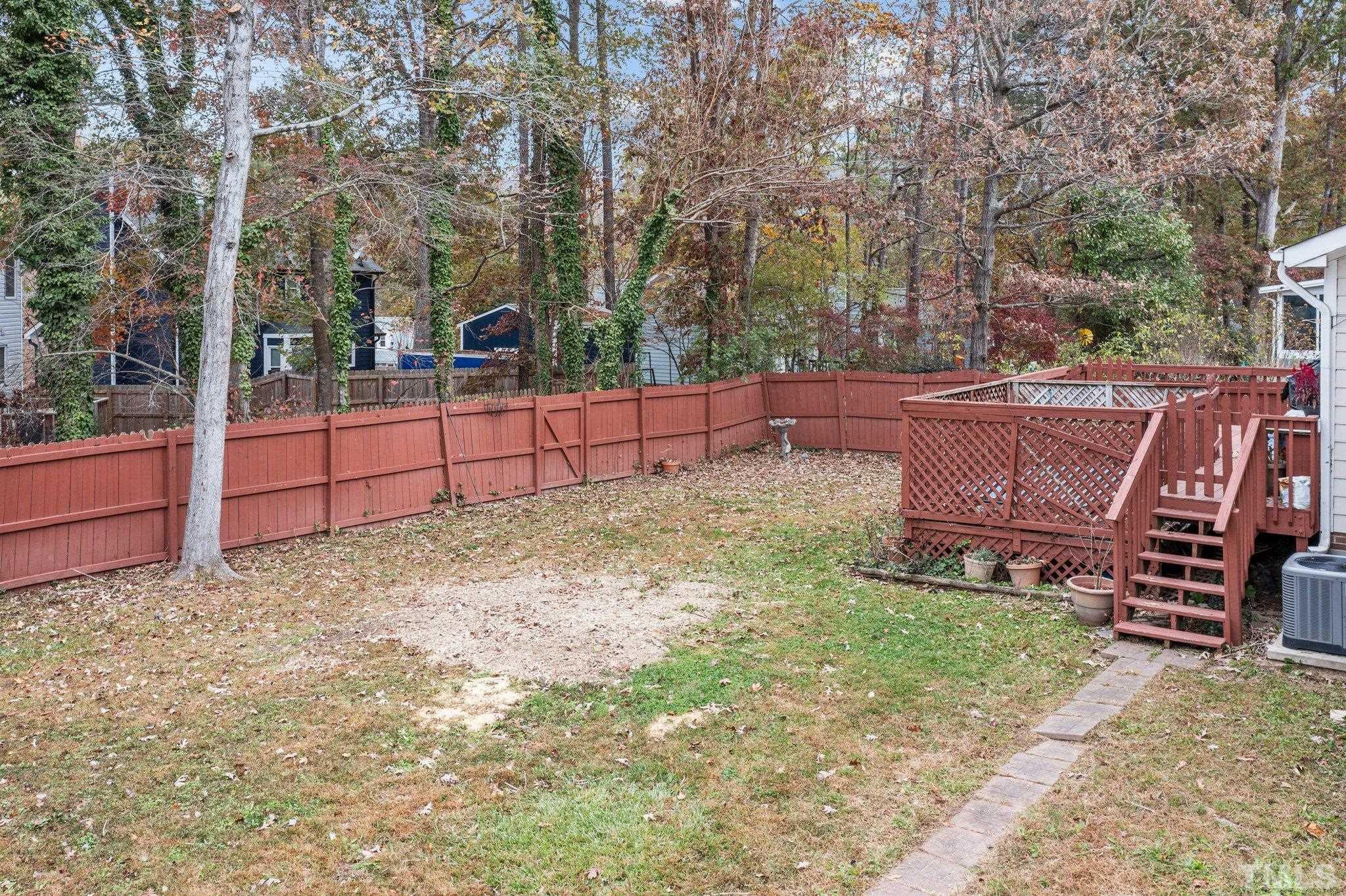 1305 Logan Street Durham, NC 27704 - Photo 23 of 32 a view of a backyard with sitting area