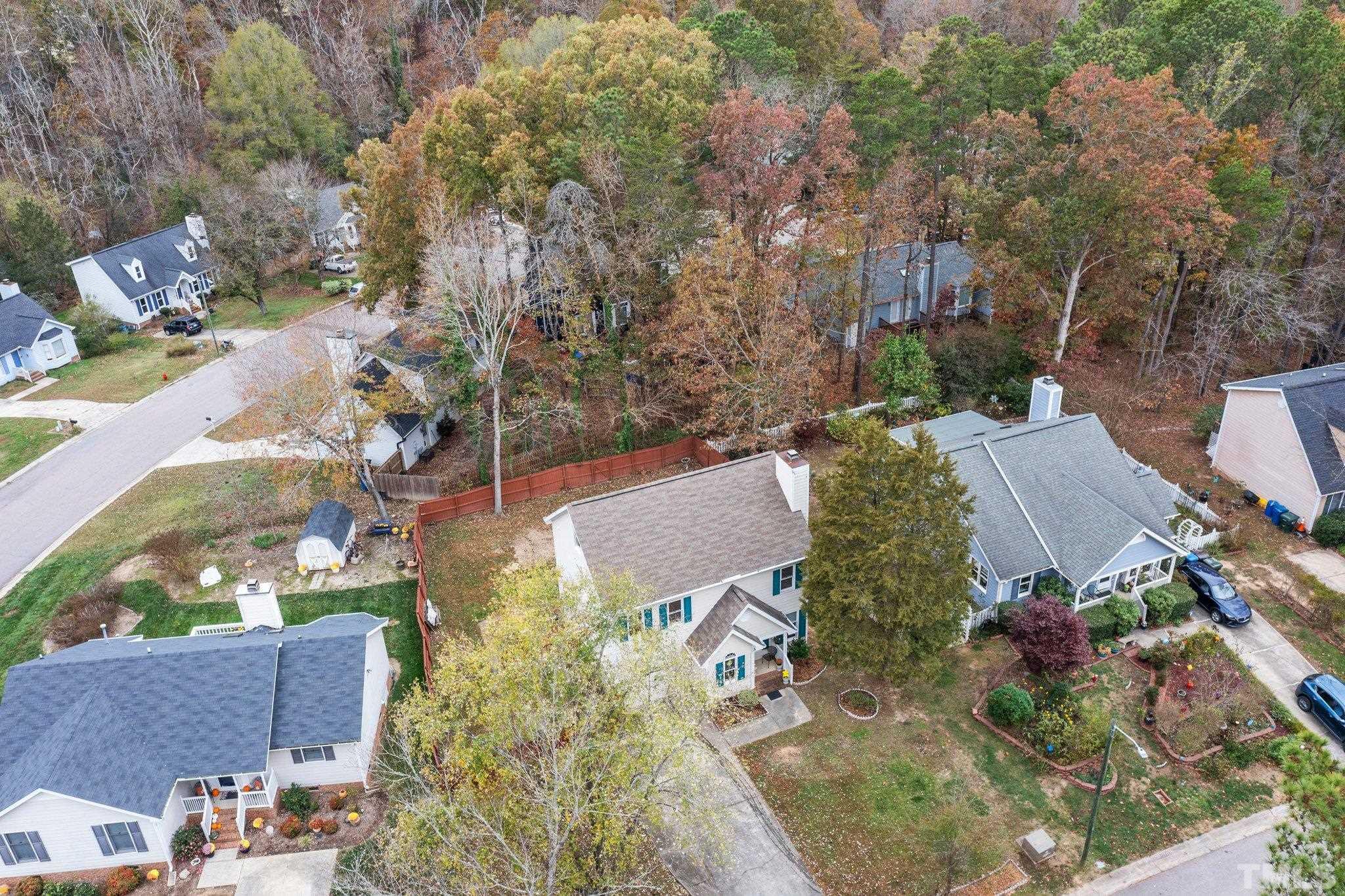 1305 Logan Street Durham, NC 27704 - Photo 30 of 32 an aerial view of a house with a yard and garden