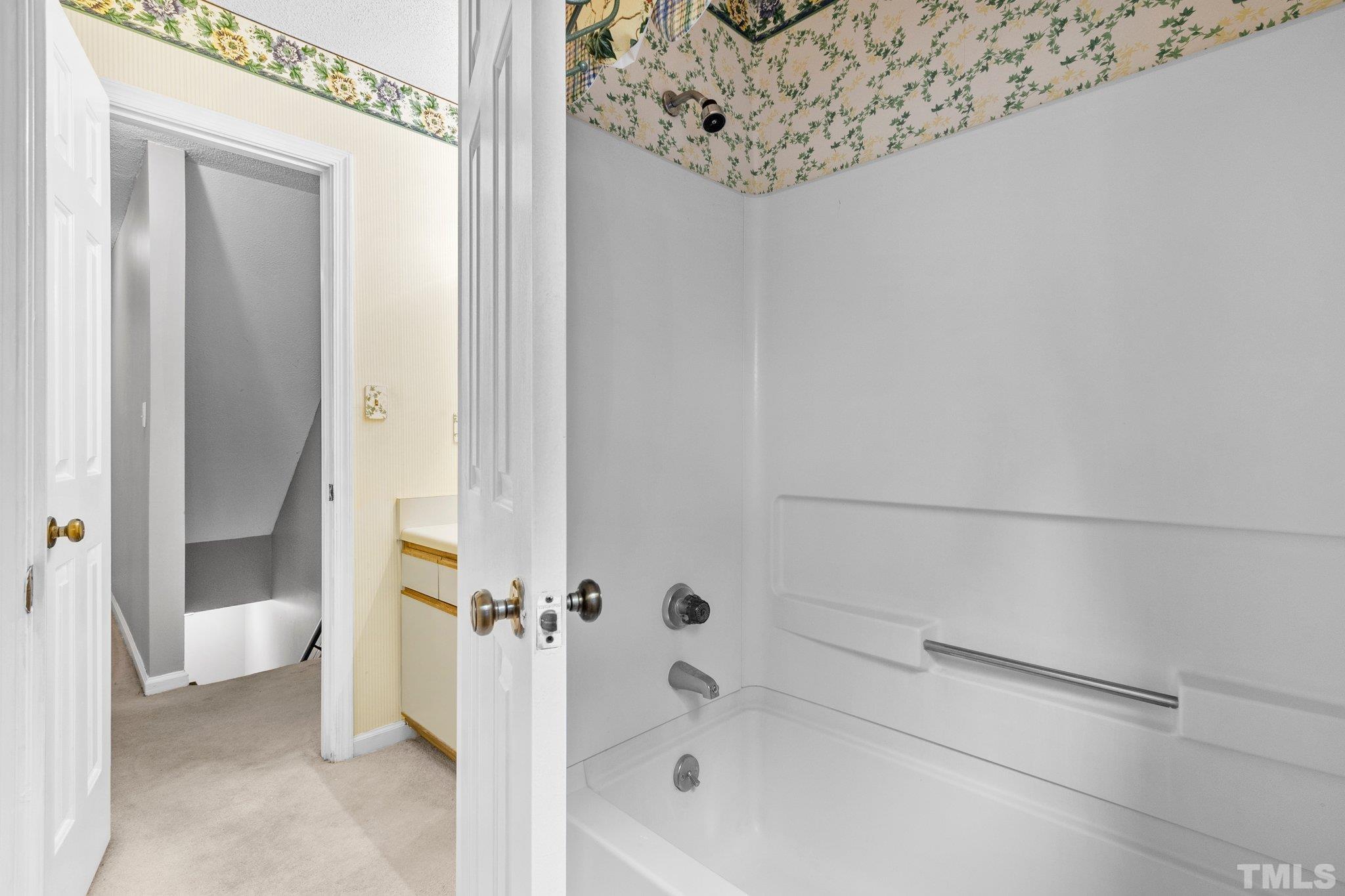 1305 Logan Street Durham, NC 27704 - Photo 10 of 32 a bathroom with a bathtub and toilet