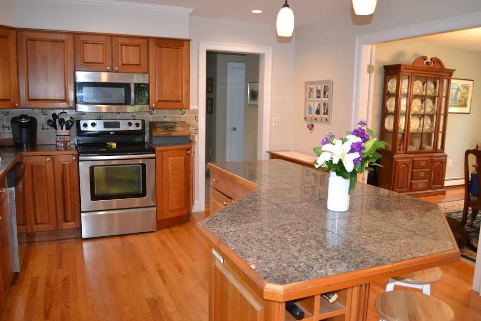 56 Stonegate Road Cape Elizabeth, ME 04107 - Photo 7 of 35 Kitchen with view into formal dining...