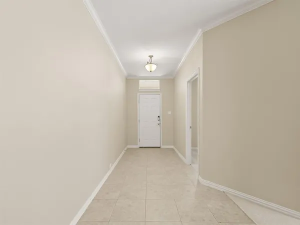 a view of a hallway with closet