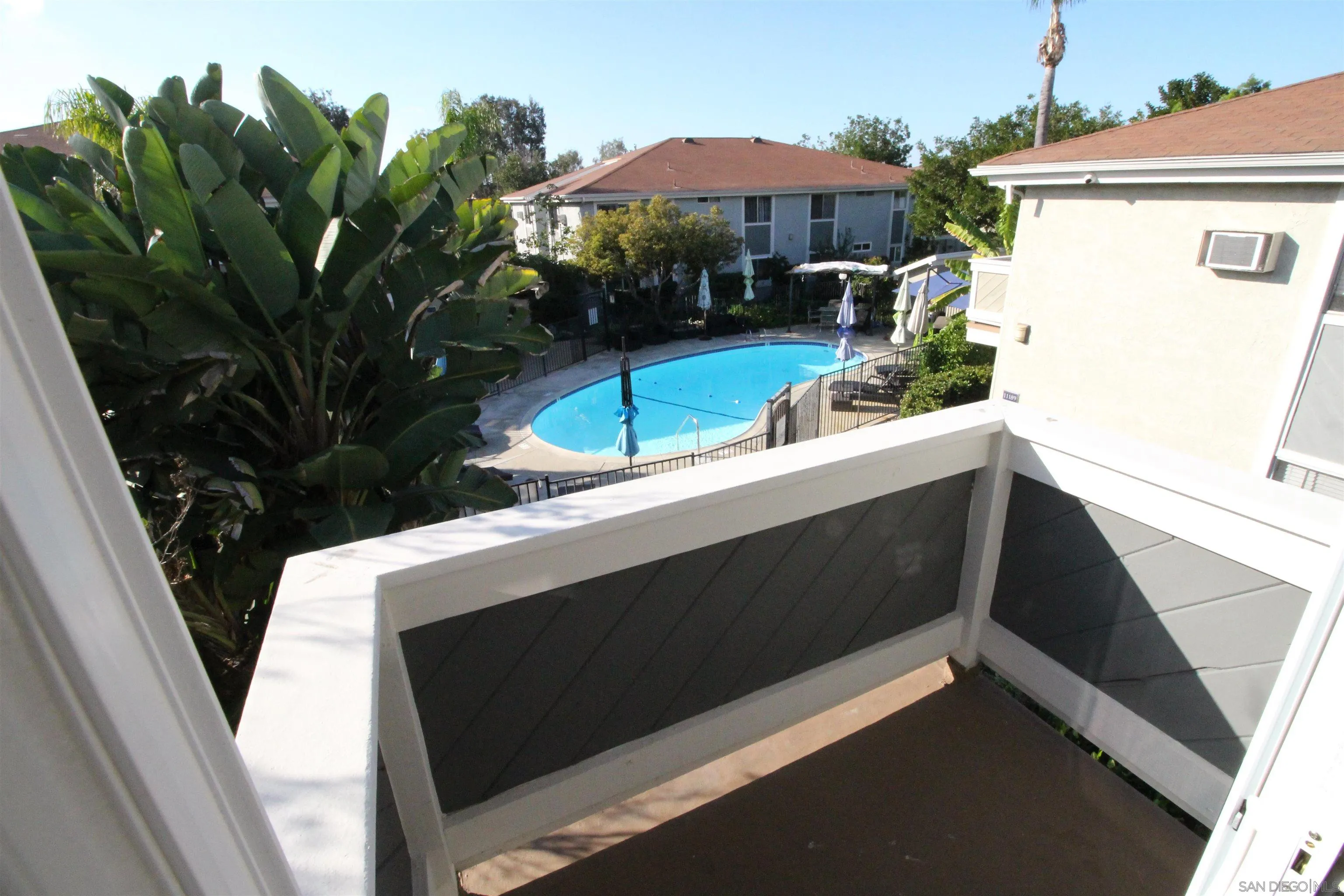 a view of outdoor kitchen with seating space