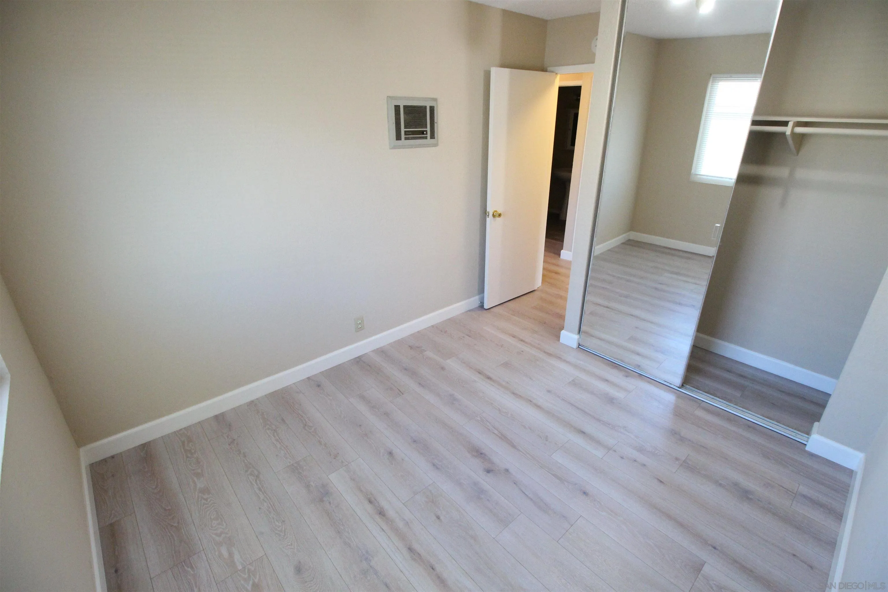 11183 Kelowna Road, Unit 36 San Diego, CA 92126 - Photo 13 of 19 wooden floor in an empty room