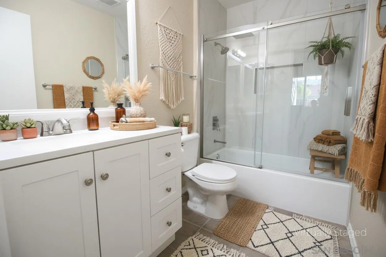 11183 Kelowna Road, Unit 36 San Diego, CA 92126 - Photo 5 of 19 a bathroom with a sink a toilet and shower