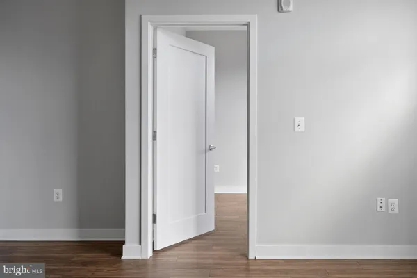 a view of a livingroom from a hallway
