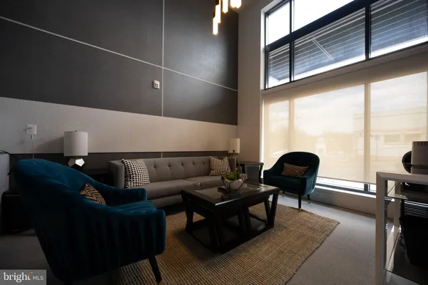 a view of a livingroom with furniture