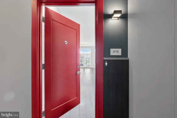 a bathroom with a mirror and a shower