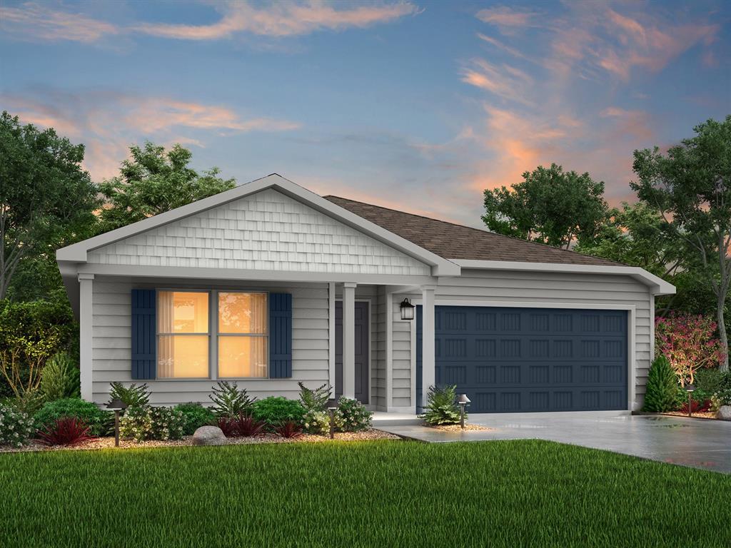 2400 Tinker Trail Wichita Falls, TX 76306 - Photo 1 of 1 a front view of a house with a yard and garage