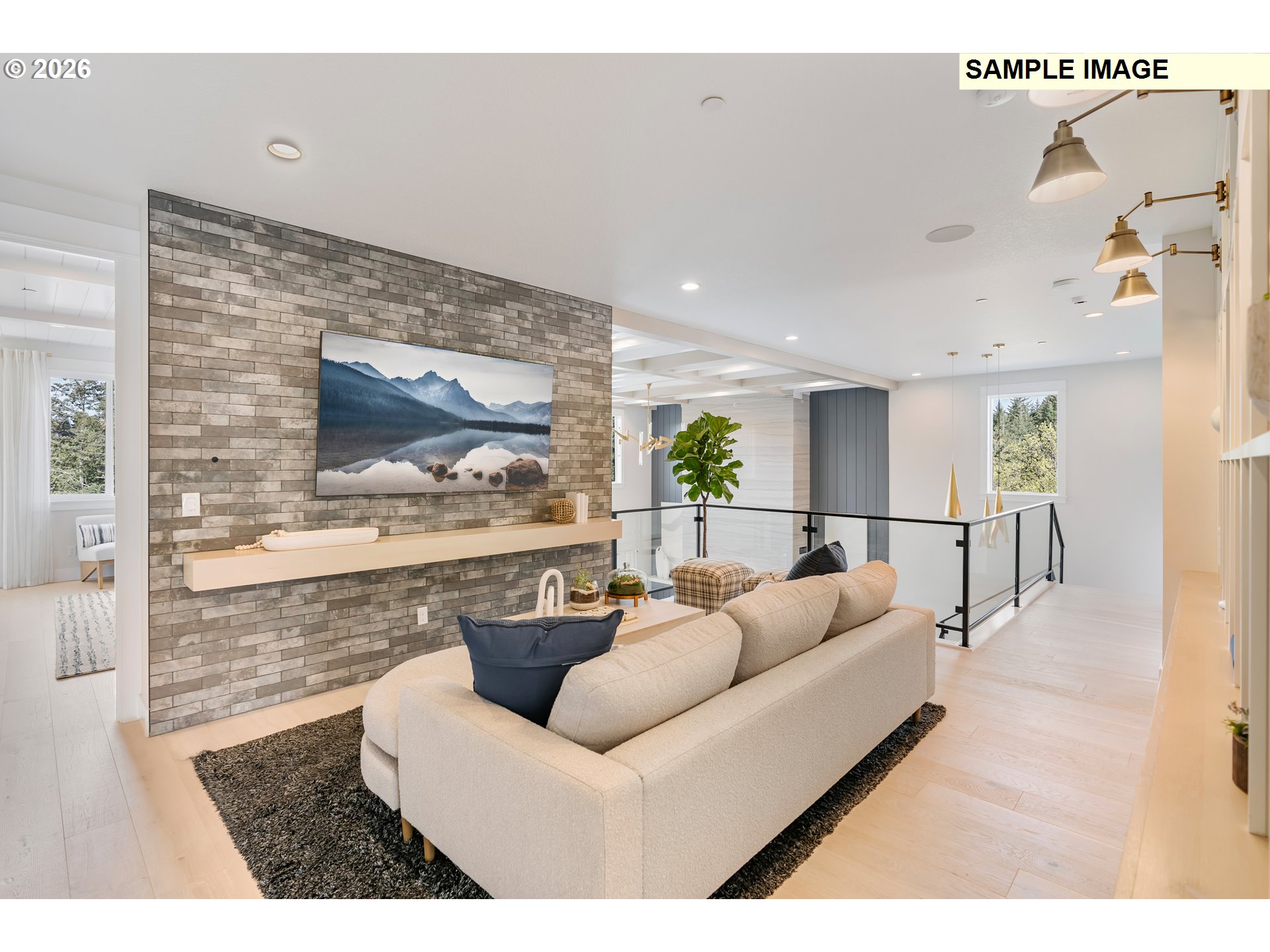 1509 South Creekview Place, Unit L6 Ridgefield, WA 98642 - Photo 19 of 44 a living room with furniture and a flat screen tv