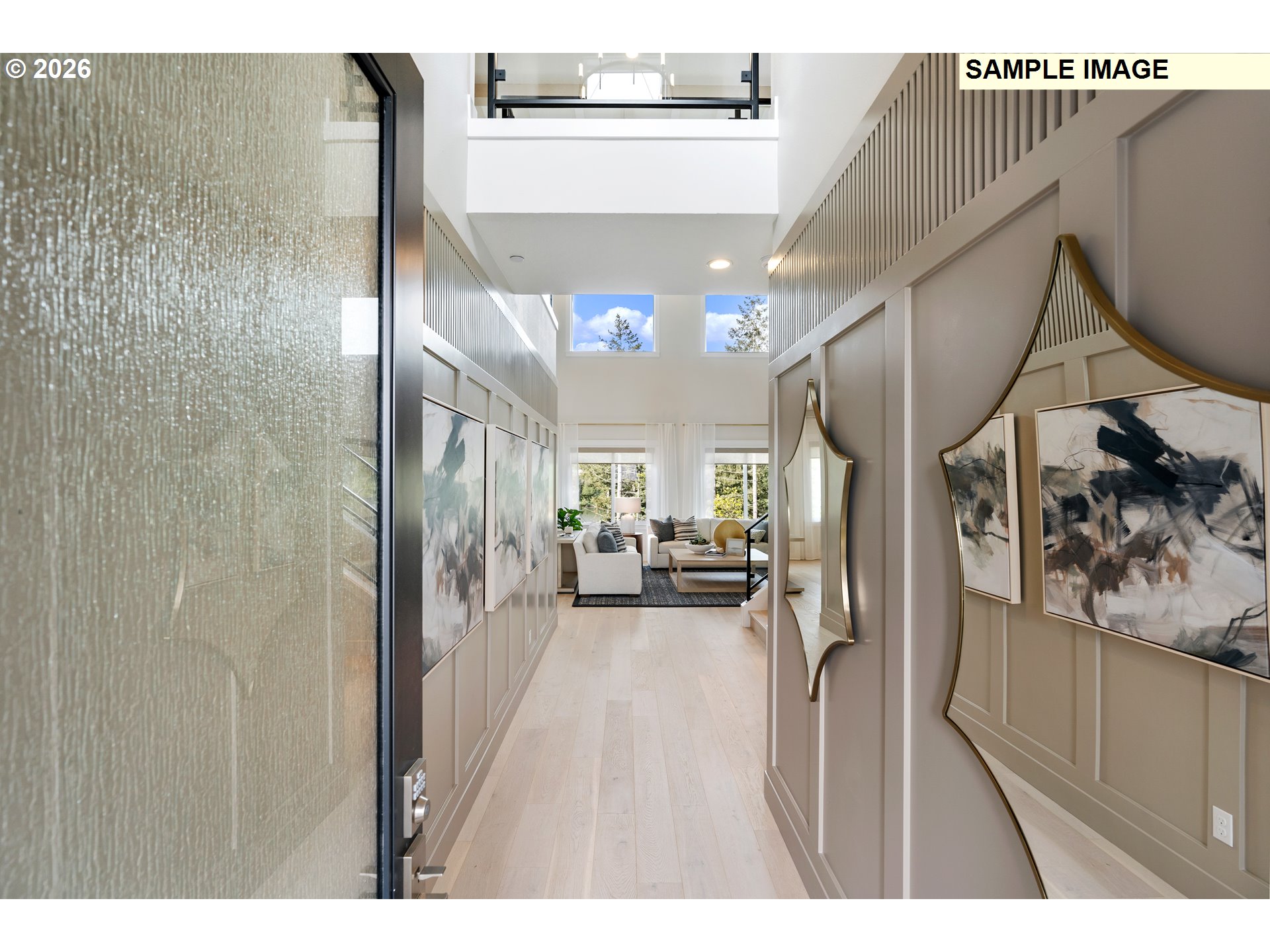 1509 South Creekview Place, Unit L6 Ridgefield, WA 98642 - Photo 2 of 44 a view of a hallway with a dining table & chairs